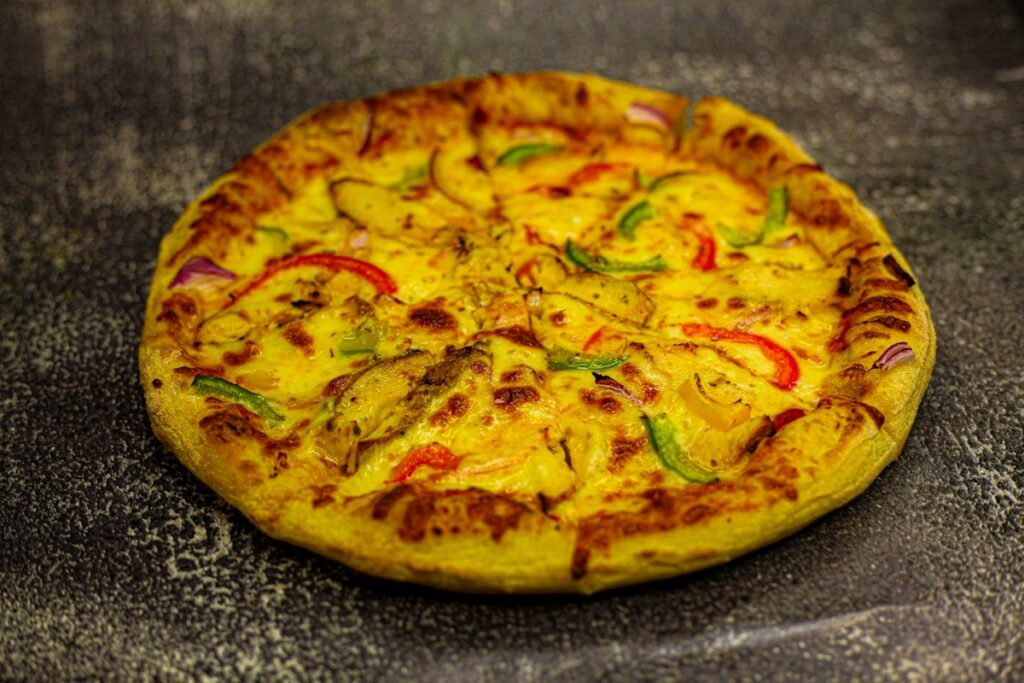 Menu Vegetarian pizza with peppers and cheese