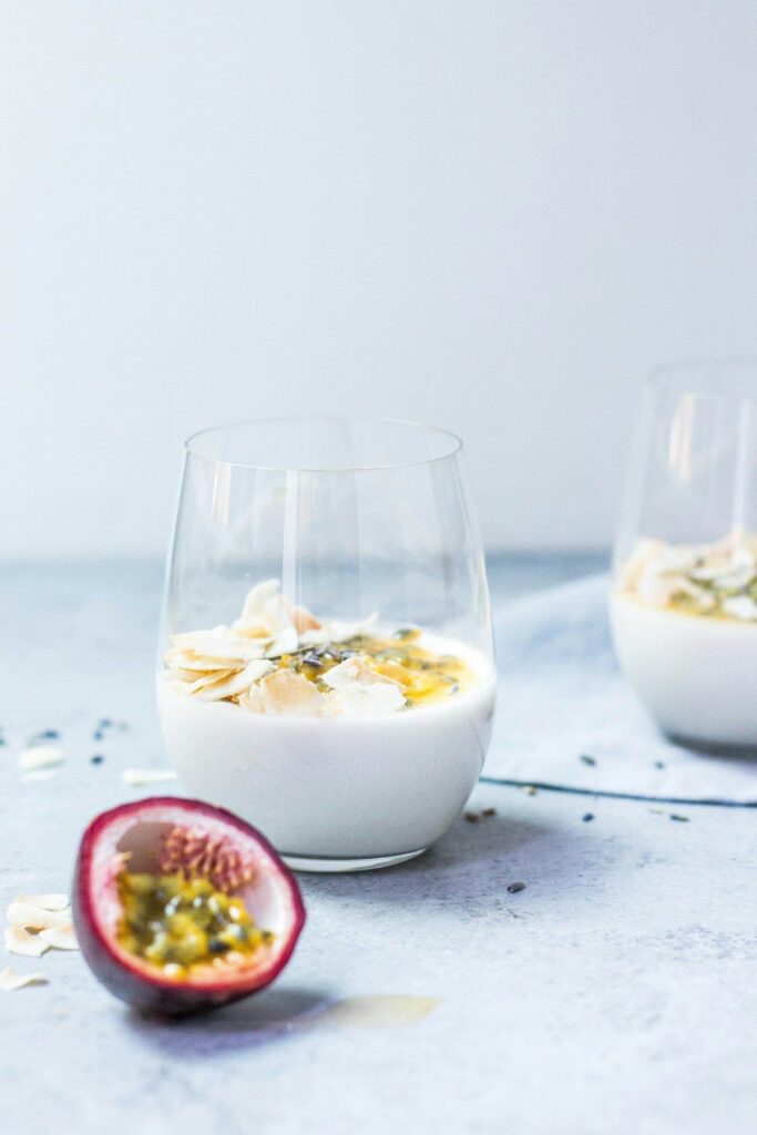 Menu Cream dessert in a glass with passion fruit