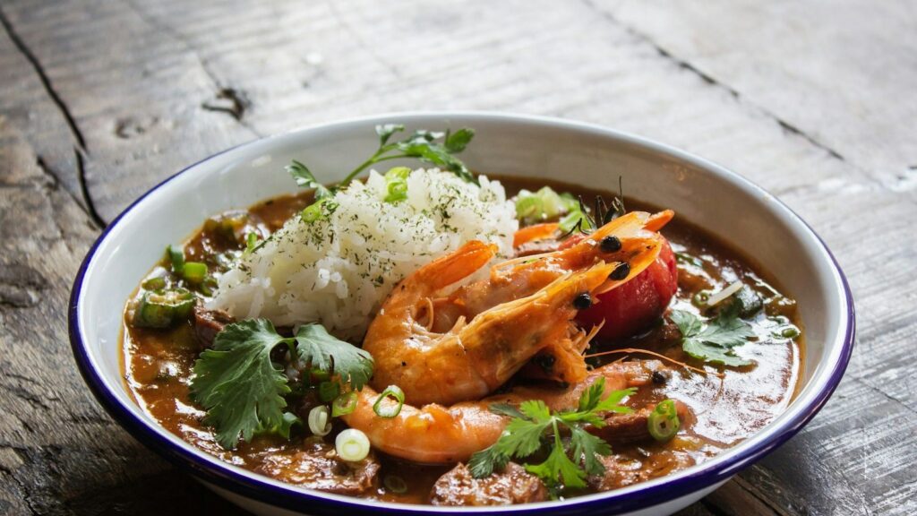 Menu Prawns with rice and herbs in a bowl